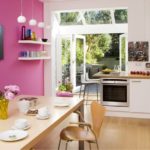 Pink accent wall kitchen design