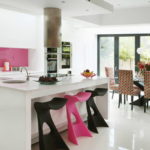 Pink accents in a white kitchen
