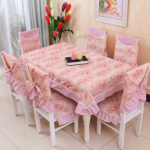 The combination of a tablecloth with chair covers