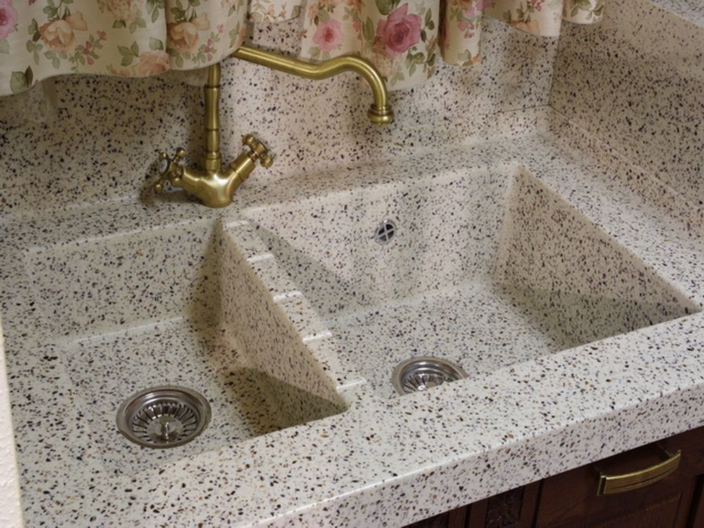 Vintage faucet over marble chips