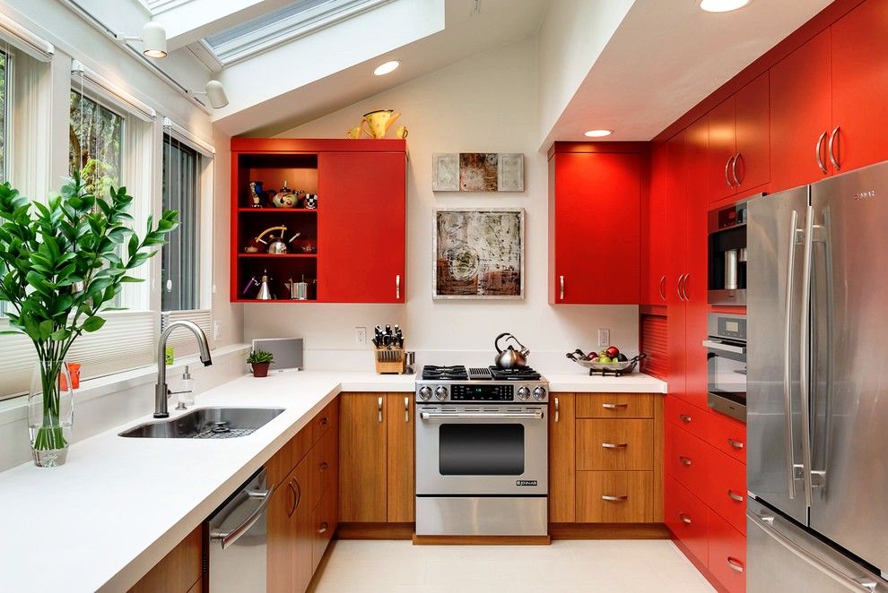 Gas stove in the kitchen with red furniture