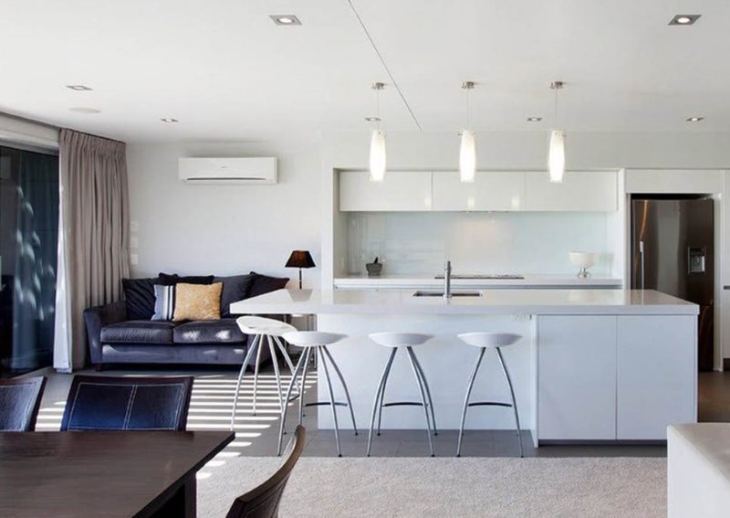 Bright high-tech kitchen-living room