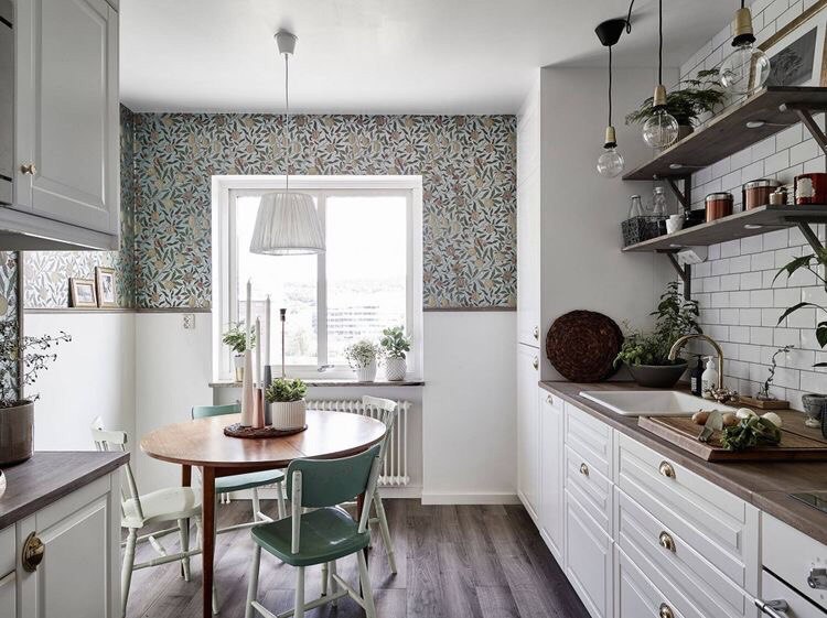 Bright kitchen with wallpaper after renovation in 2019