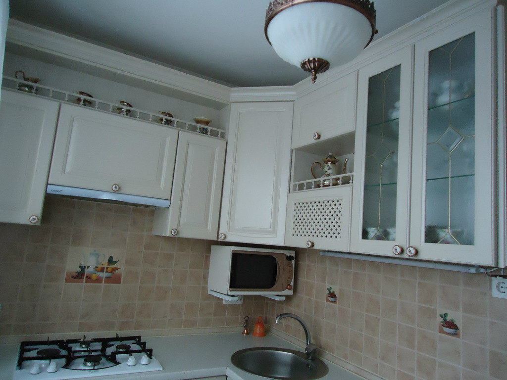 White ceiling in a small square kitchen