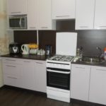 Linear kitchen with gas stove