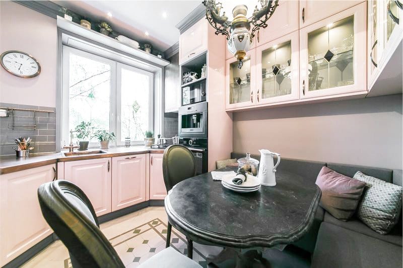 Pink color in the interior of a classic kitchen