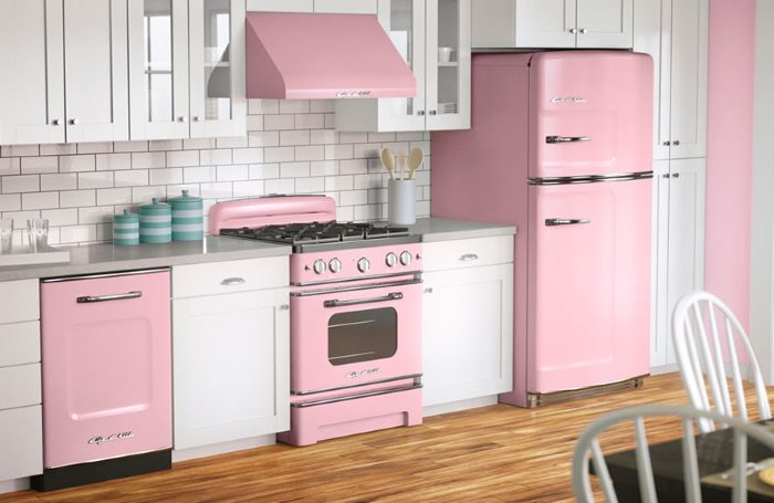 Linear kitchen with pink fridge