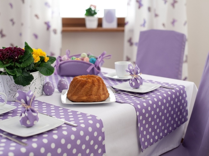 Lilac napkins on a white tablecloth