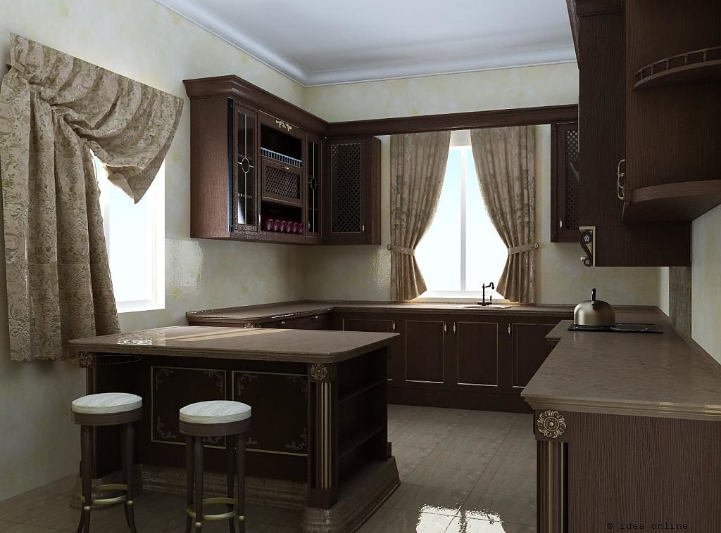 Brown kitchen furniture with light walls.