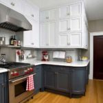 Navy cabinets and white wall cabinets