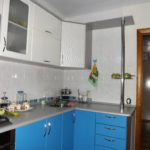 Blue doors of kitchen cabinets