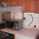 Microwave on the kitchen worktop