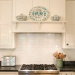 Decorative plates on the kitchen hood portal