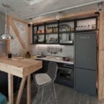 Gray fridge in a small kitchen
