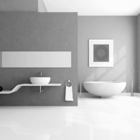 עיצוב אמבטיה בצבע אפור ולבן.