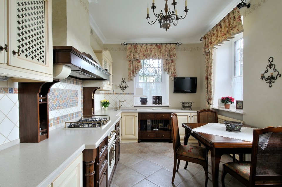 Long provence style kitchen with short curtains
