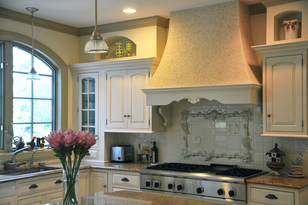 Fireplace hood in the interior of a classic kitchen