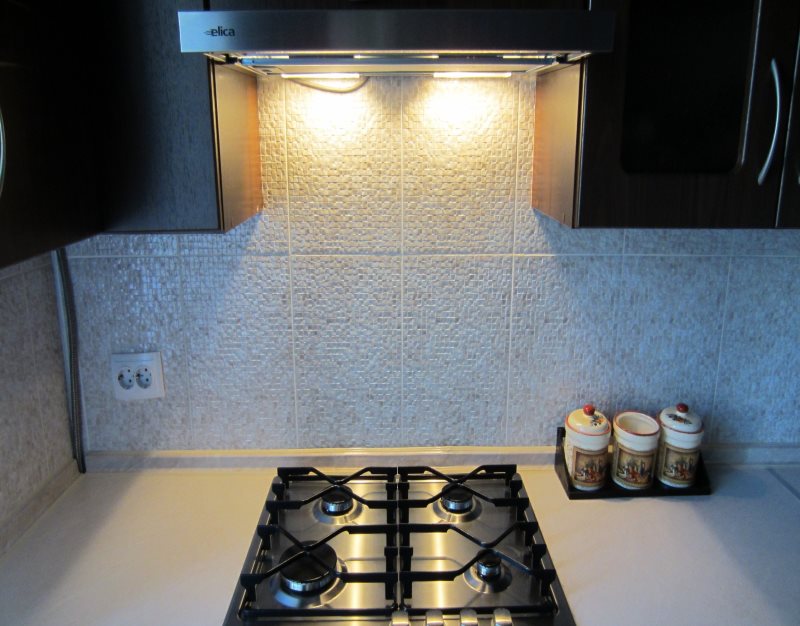 Gas cooker hood with backlight