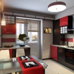 Accents of red in the kitchen with a balcony