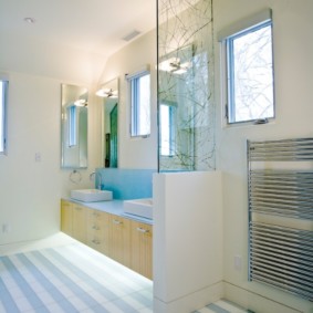 Natural light in the bathroom with striped floor