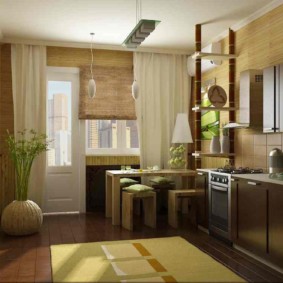 Kitchen design with balcony in a city apartment