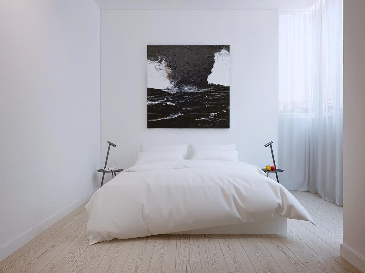 Minimalismusartschlafzimmer mit einem Bild