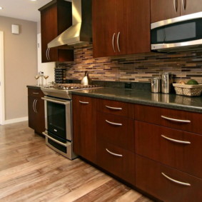 Laminate floor in the interior of the kitchen