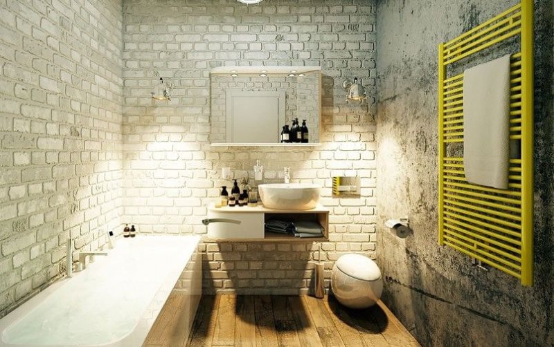 מעקה מגבות מחומם צהוב בחדר אמבטיה בסגנון לופט