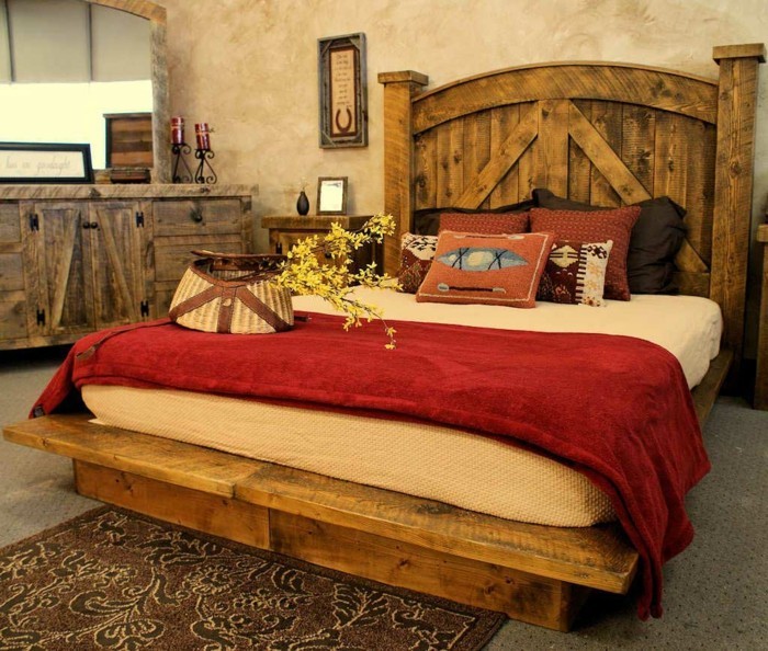 Wooden lacquered bed in a rustic bedroom
