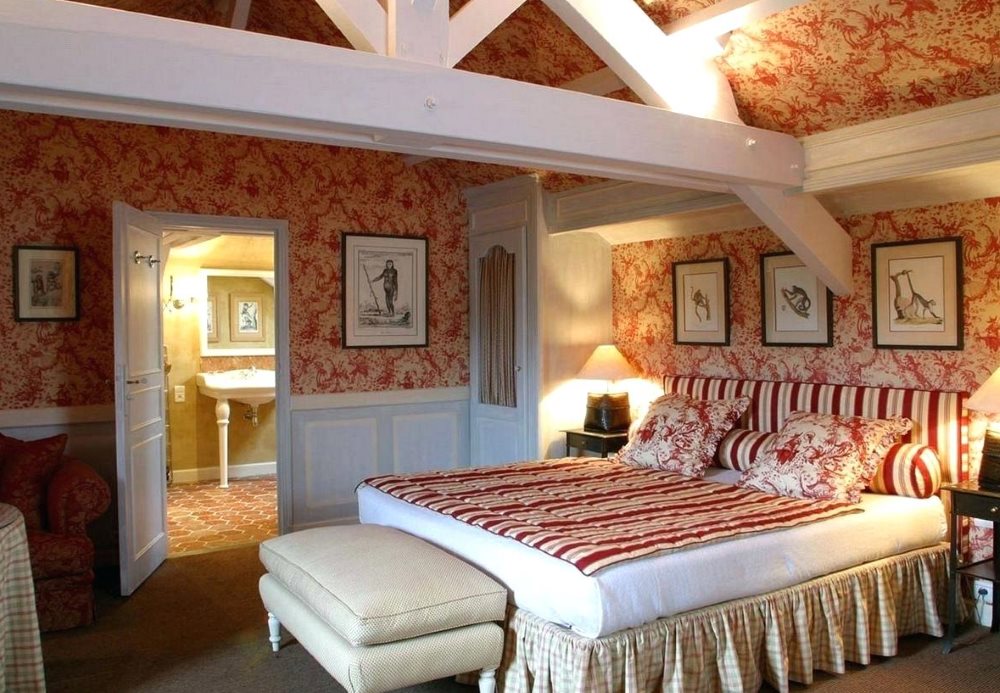 Painted wooden beams on the bedroom ceiling