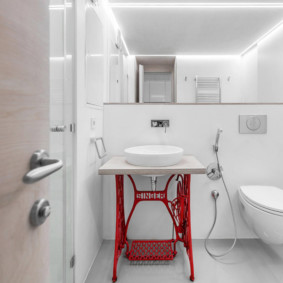 Accent red in a white bathtub