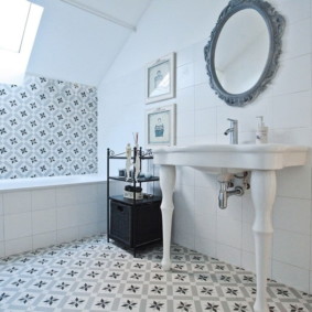 White washbasin with curly legs