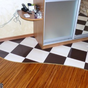 combination of tile and laminate in the hallway design ideas