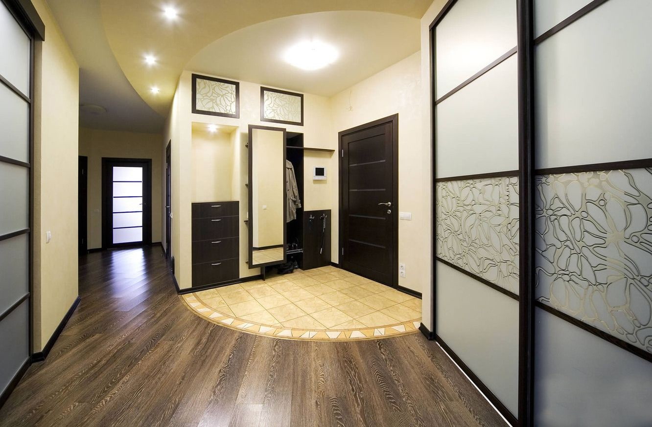 combination of tile and laminate in the hallway
