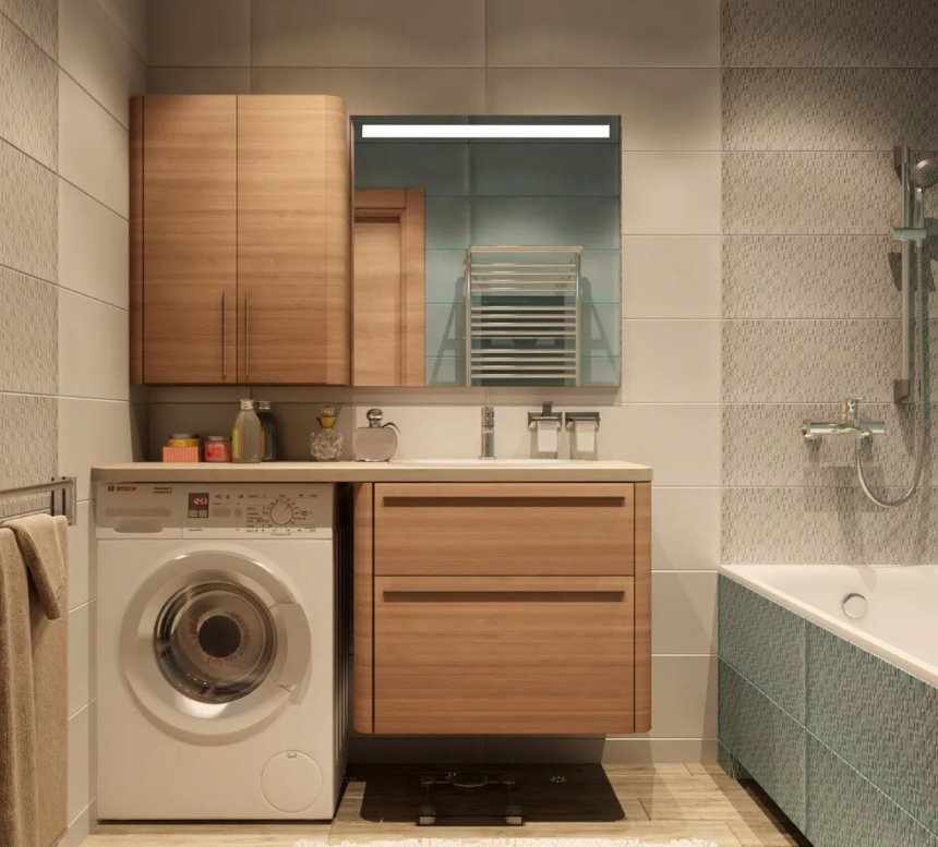 Bathroom with a washing machine under the countertop