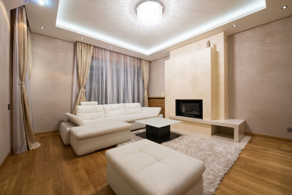 White furniture in the hall with a fireplace