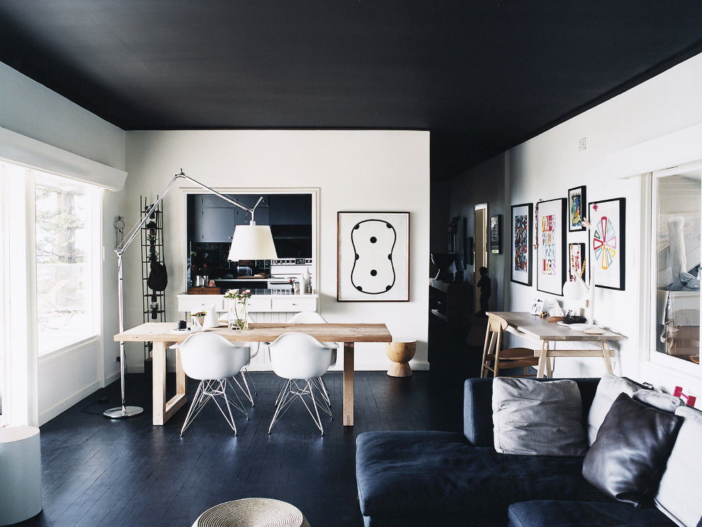 Cozy living room with a black stretch ceiling