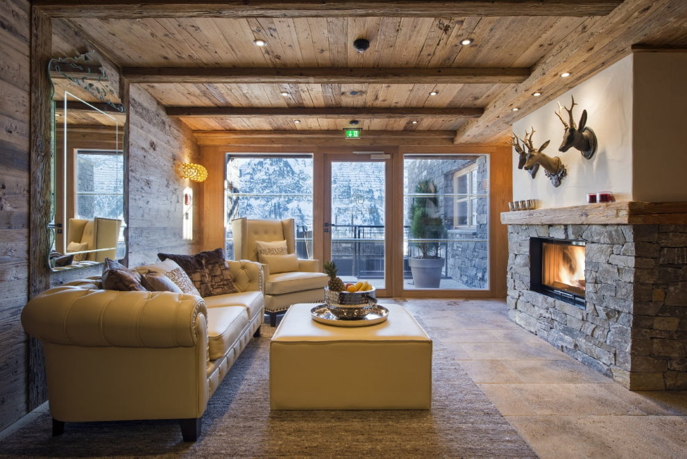 Living room in a house with wooden ceiling