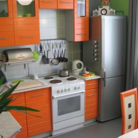 Orange facades of a kitchen set