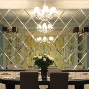 Mirror tiles over the dining table