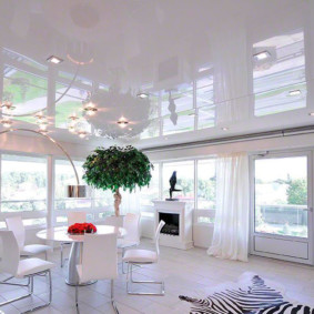 Snow-white interior of a large living room