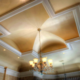 Niches on the ceiling of the living room of a private house