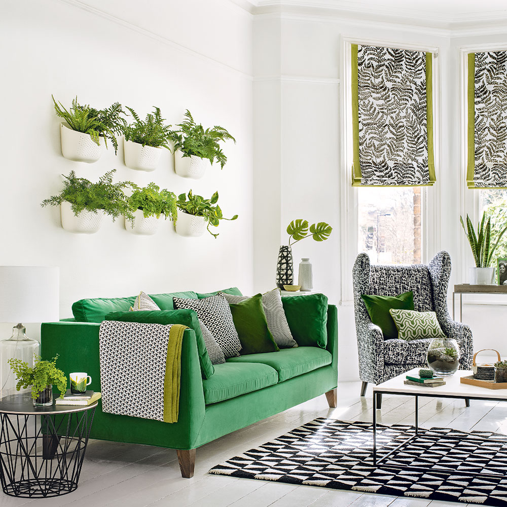 ห้องนั่งเล่นในแนวคิดการออกแบบตกแต่งภายในสีเขียว