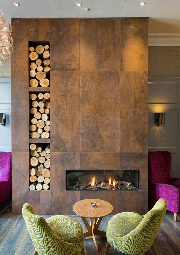 Wall fireplace in the interior of a modern living room