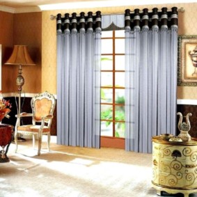 curtains on the grommets in the living room design photo
