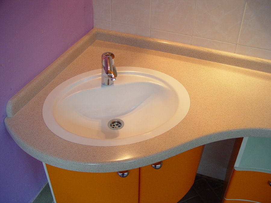 White sink in beige countertop