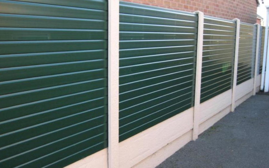 Green PVC panels on white plastic poles
