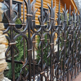 Cold forged metal fence
