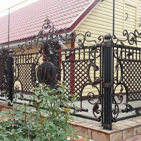 Beautiful fence in the courtyard of a country house