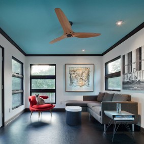Blue ceiling in a small living room